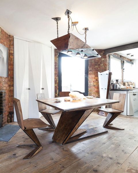 Maximizing Space with Industrial Dining Tables in Open Loft Designs